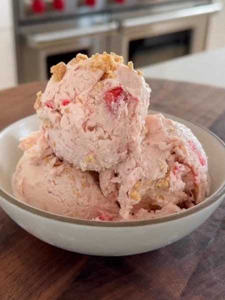 a bowl with cheesecake ice cream balls