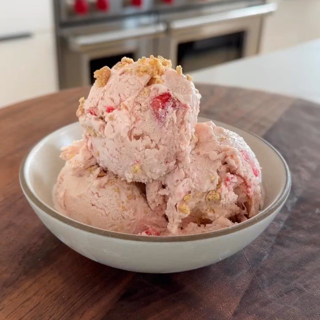 a bowl with cheesecake ice cream balls